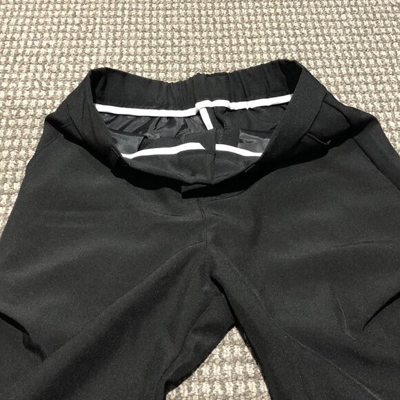 Black baggy slacks with folds. Beautiful peice, the folds make it sit right, so - Picture 4 of 6